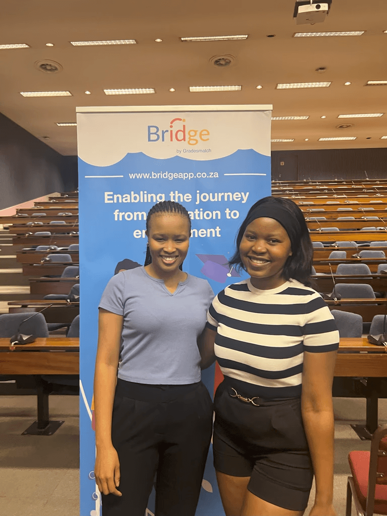 Students with Bridge banner